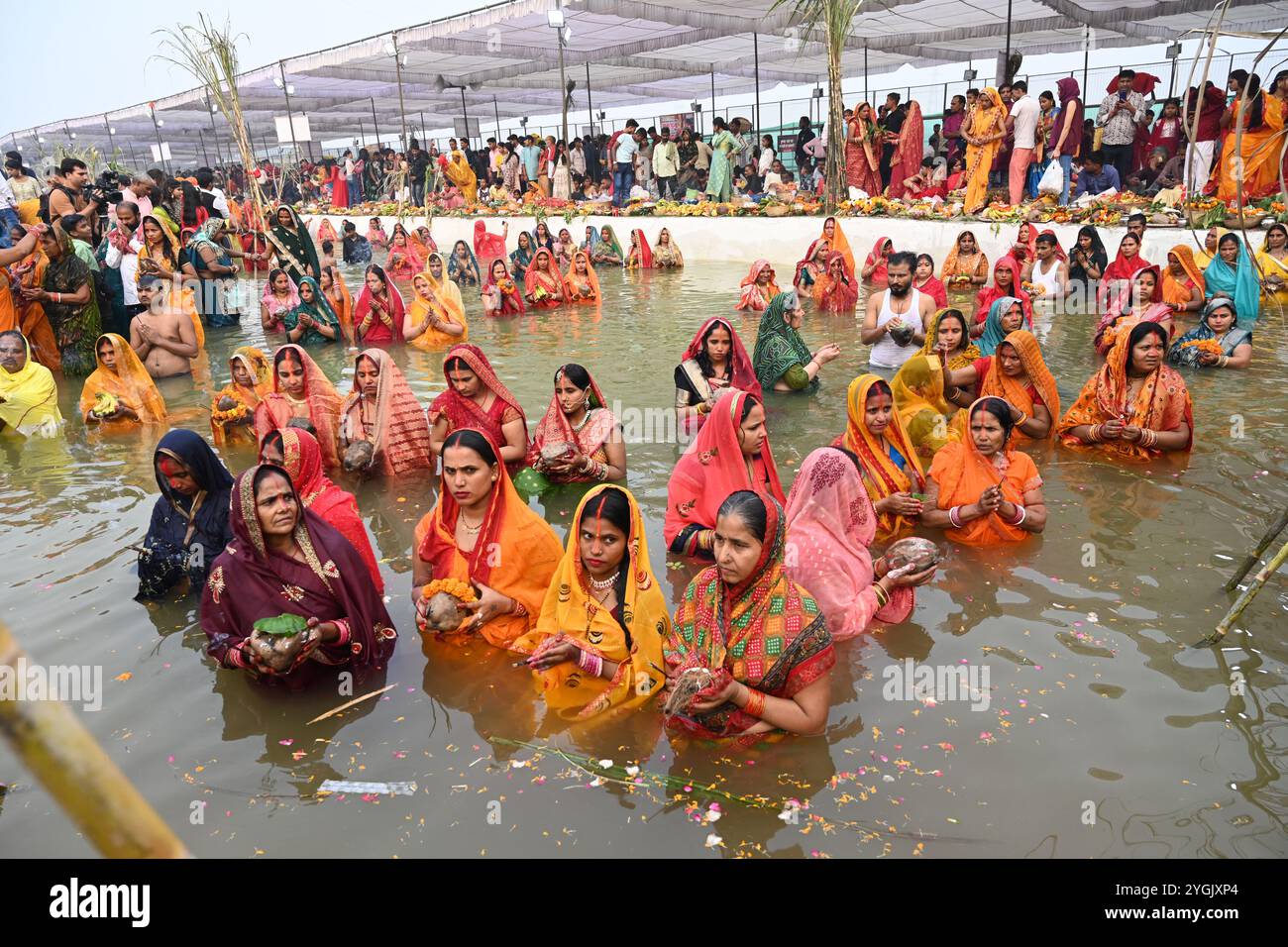 Chhatt NEW DELHI, INDIA - NOVEMBER 7: Hindu devotees seen performing rituals ...