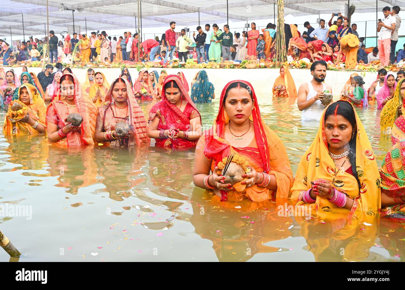 Chhatt NEW DELHI, INDIA - NOVEMBER 7: Hindu devotees seen performing rituals ...