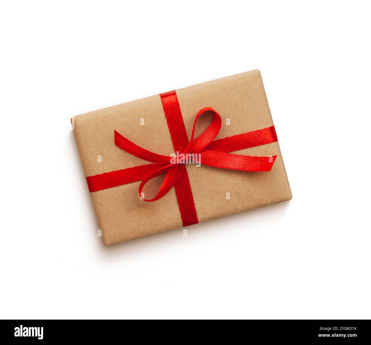 Gift box with red ribbon bow isolated on white Stock Photo - Alamy