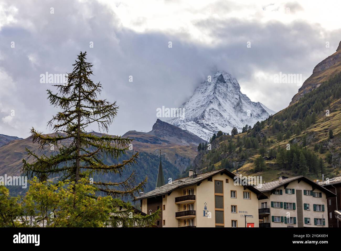 The cloudy Matterhorn photographed from the village of Zermatt Stock Photo