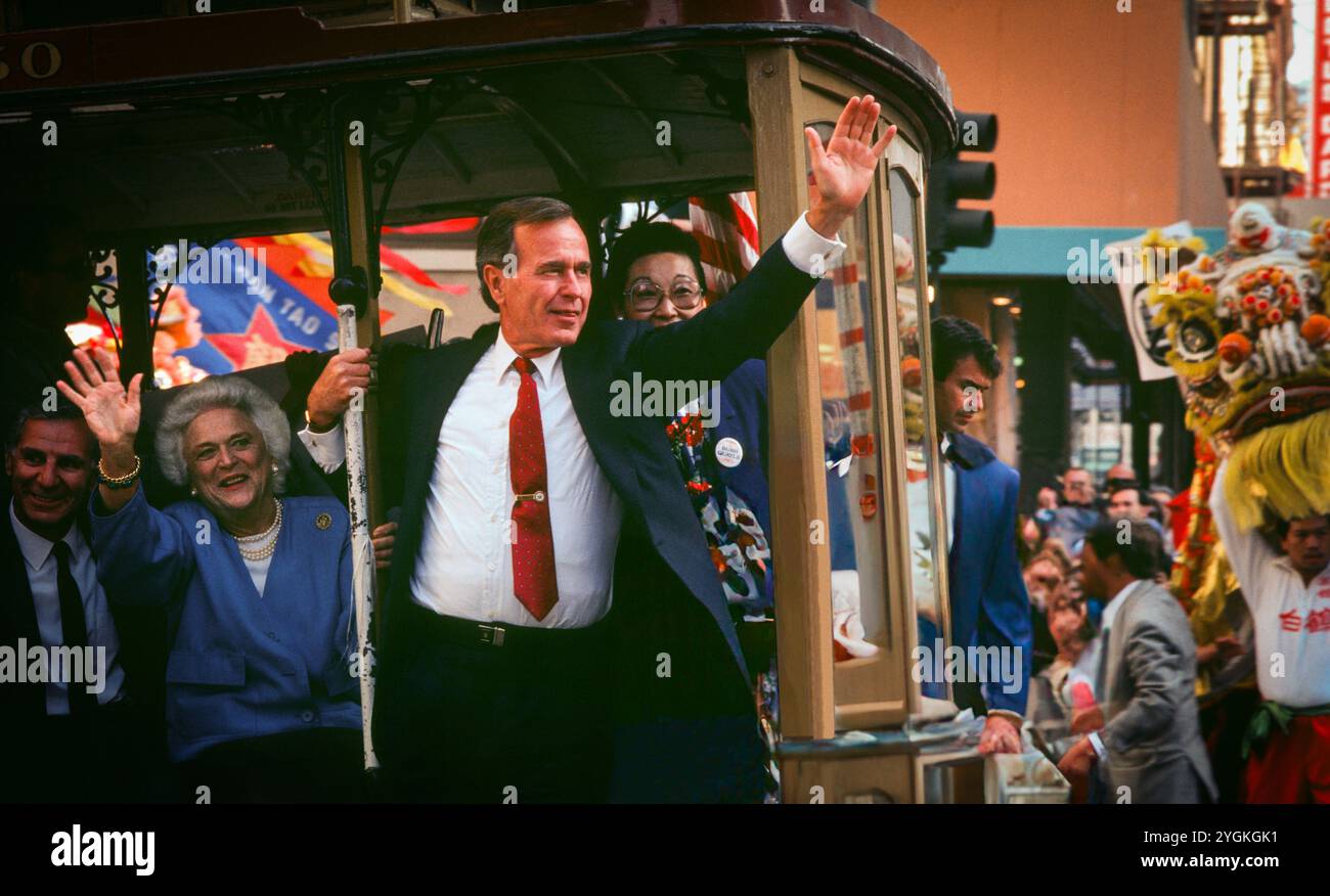 The 43rd Vice President and Republican Presidential candidate George H.W. Bush and wife Barbara wave from a cable car in San Franciso Chinatown.  09/14/1988 Stock Photo