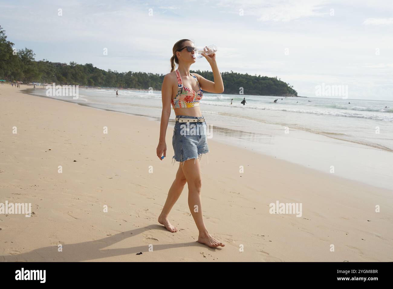 Beach woman in swimsuit hi-res stock photography and images - Alamy