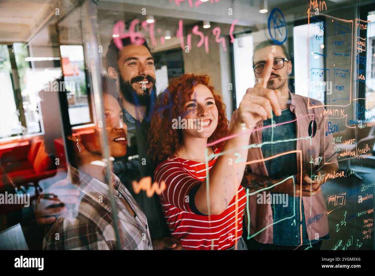 Happy software developers working on meeting, Programming advanced code artificial intelligence. Stock Photo