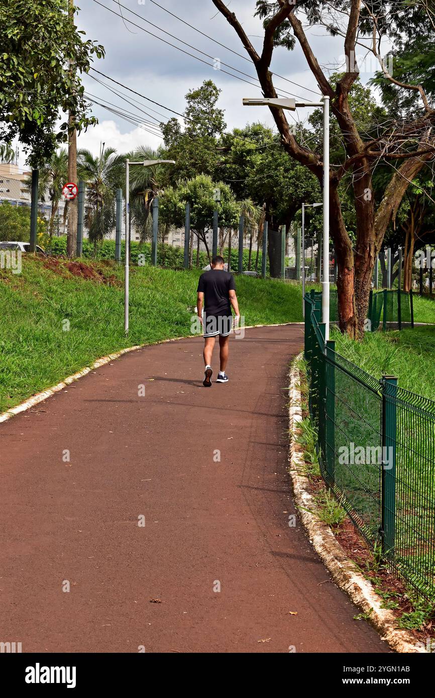 Man walking park sportswear hi-res stock photography and images - Alamy
