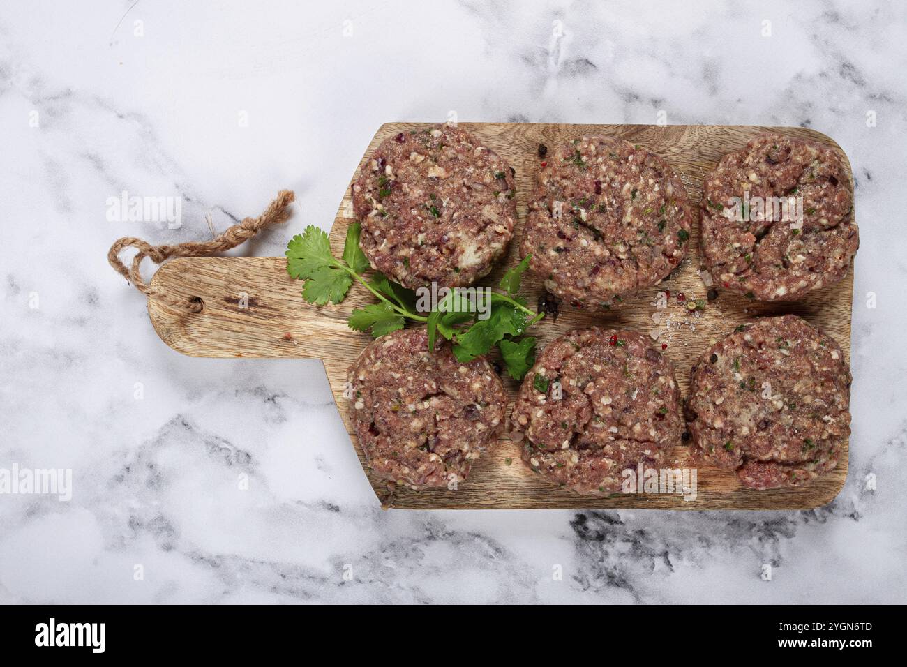 Raw cutlets, minced meat, on a chopping board, homemade, top view, no ...