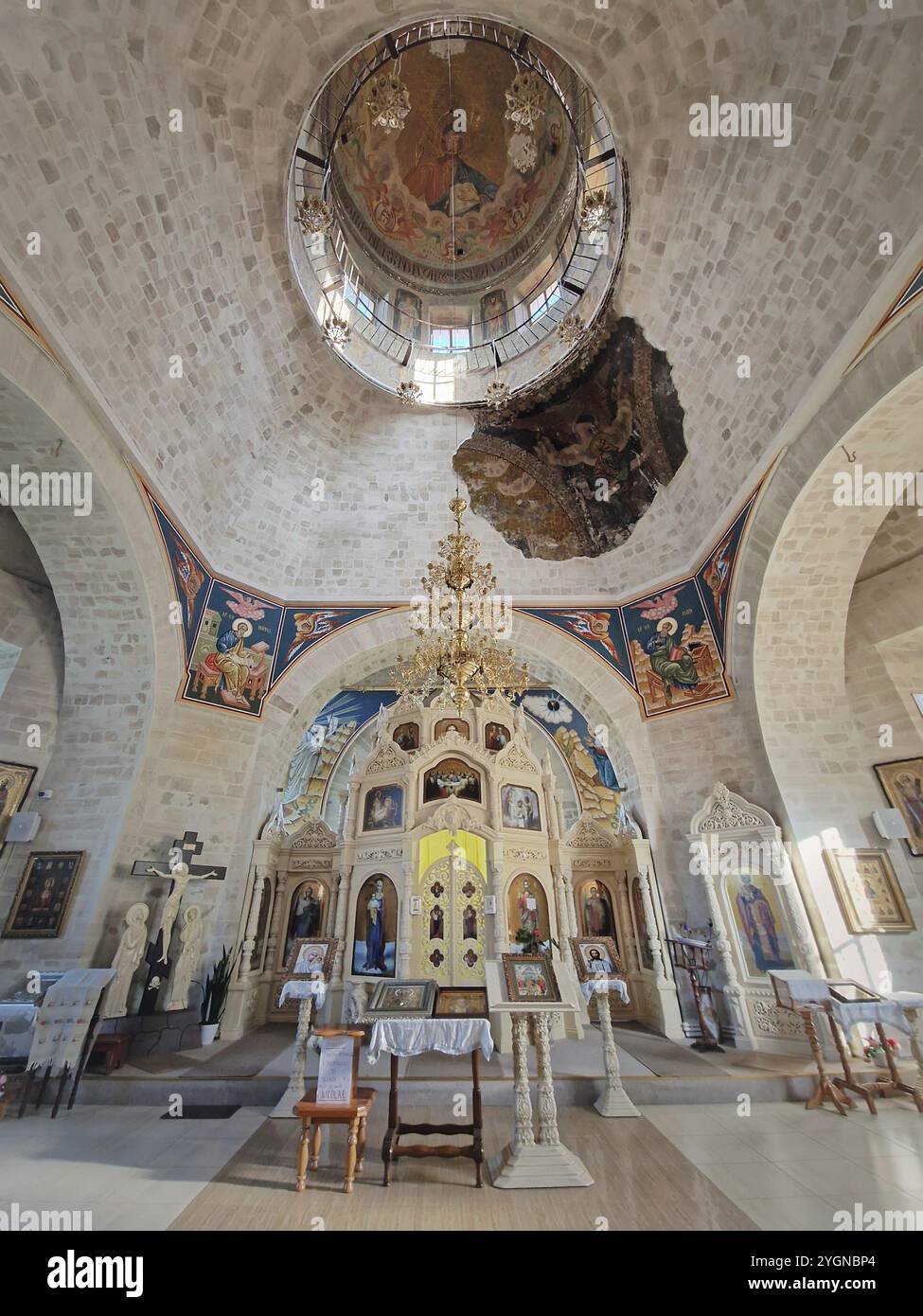 CONDRITA, CHISINAU, MOLDOVA, OCTOBER 21, 2024Condrita Monastery of St Nicholas indoors view of church altar, ornate walls with painted icons and a gol Stock Photo