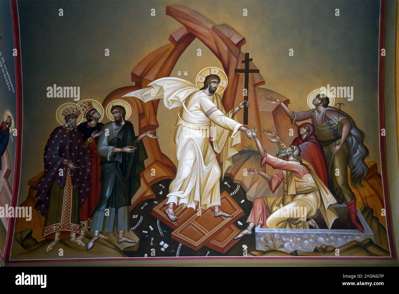 Painting of the Anastasis - the Resurrection of Christ and his Descent into Hell where he stands on the Broken Gates of Hades Jesus is Pulling up Adam Stock Photo
