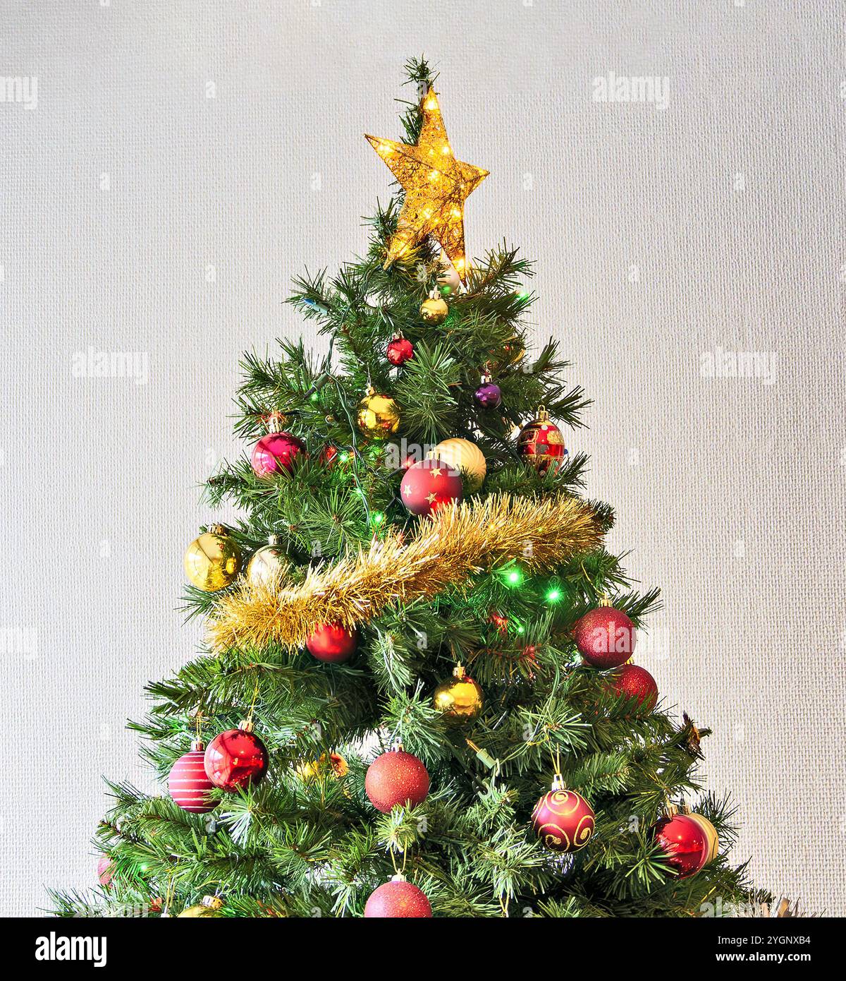 Golden star and colourful balls with color electtric lights decorating ...