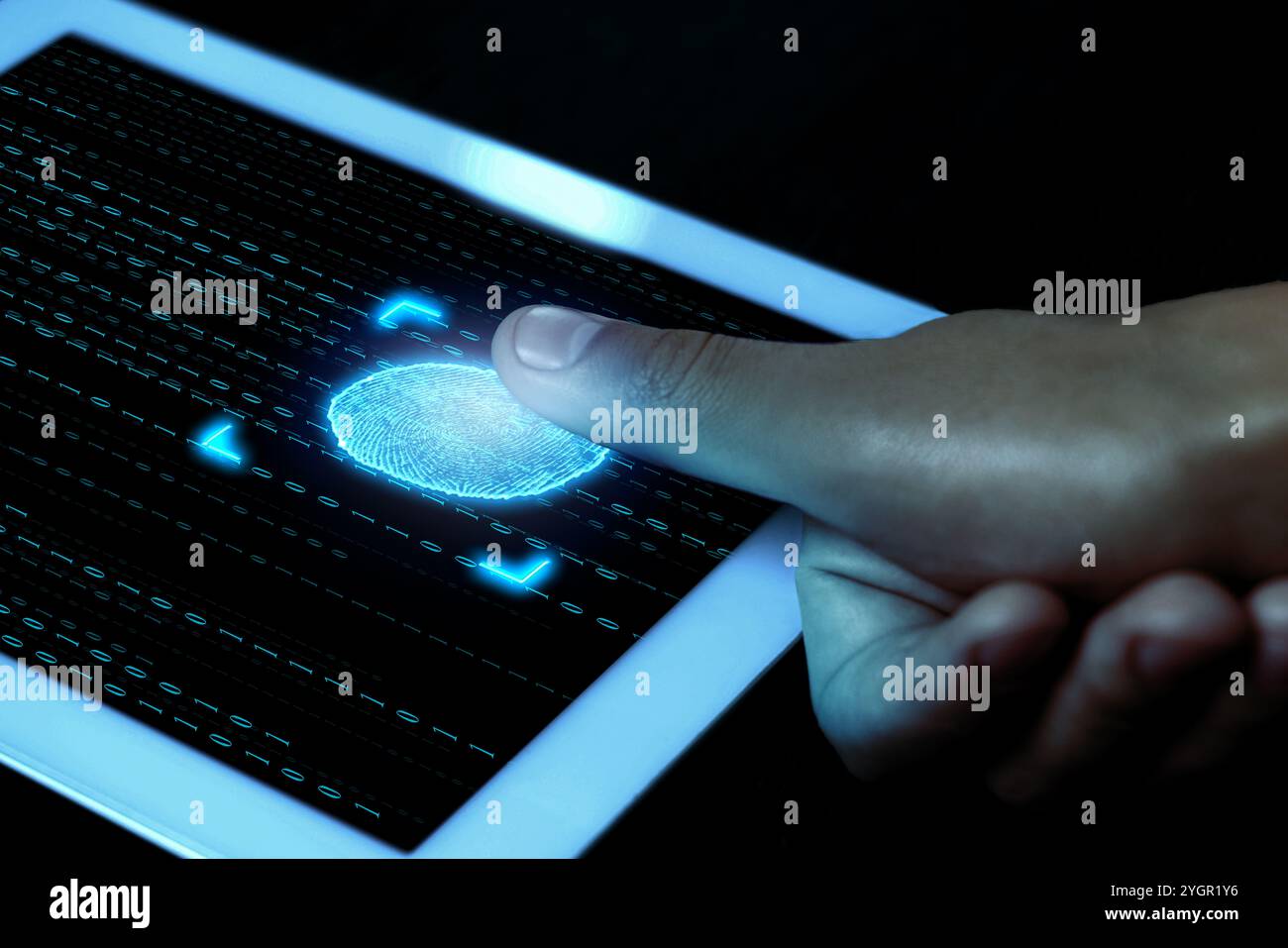 Man using fingerprint scanner in tablet by touching it, closeup Stock Photo
