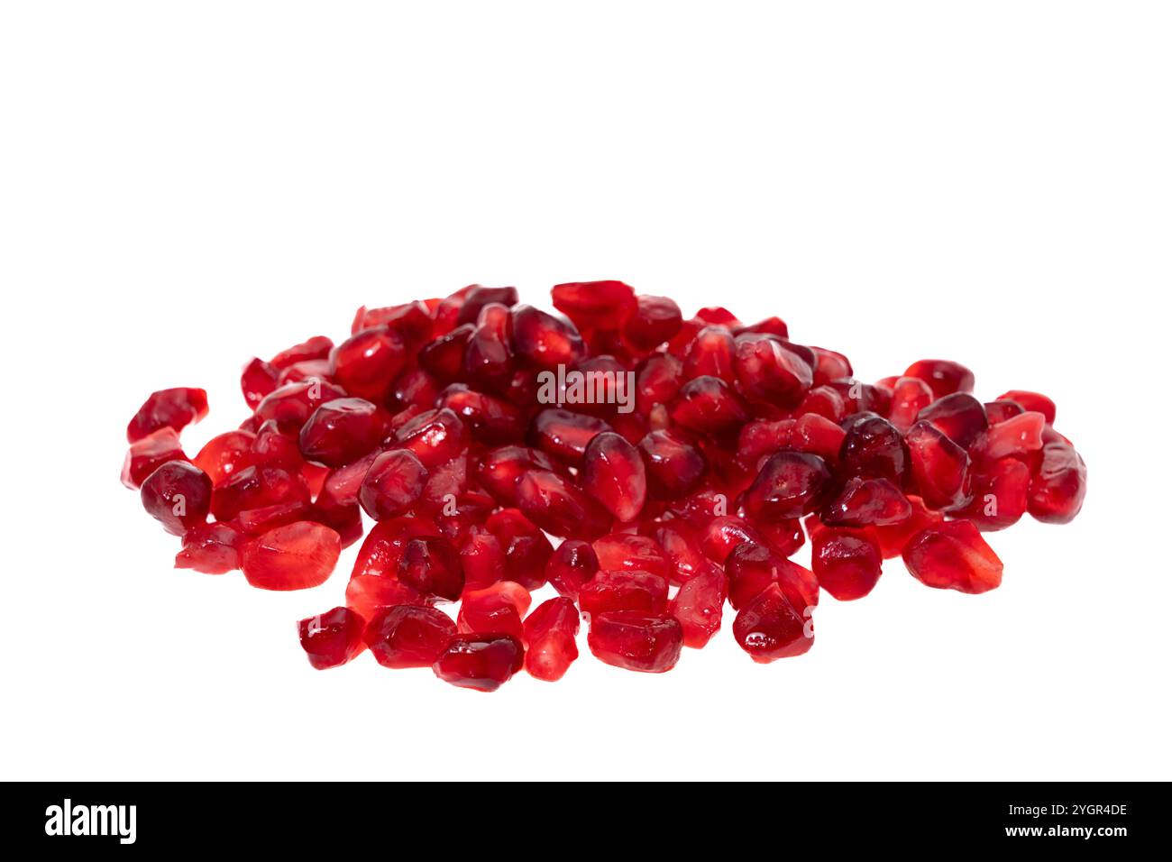 Red pomegranate seeds isolated on white background Stock Photo