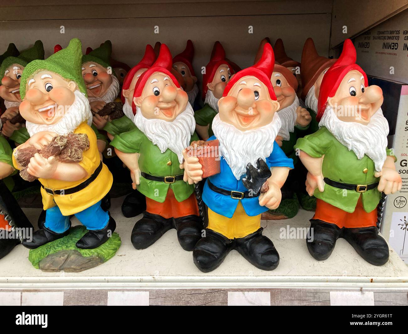 Picture of Selection of colourful Garden Gnomes for sale at the garden centre ...