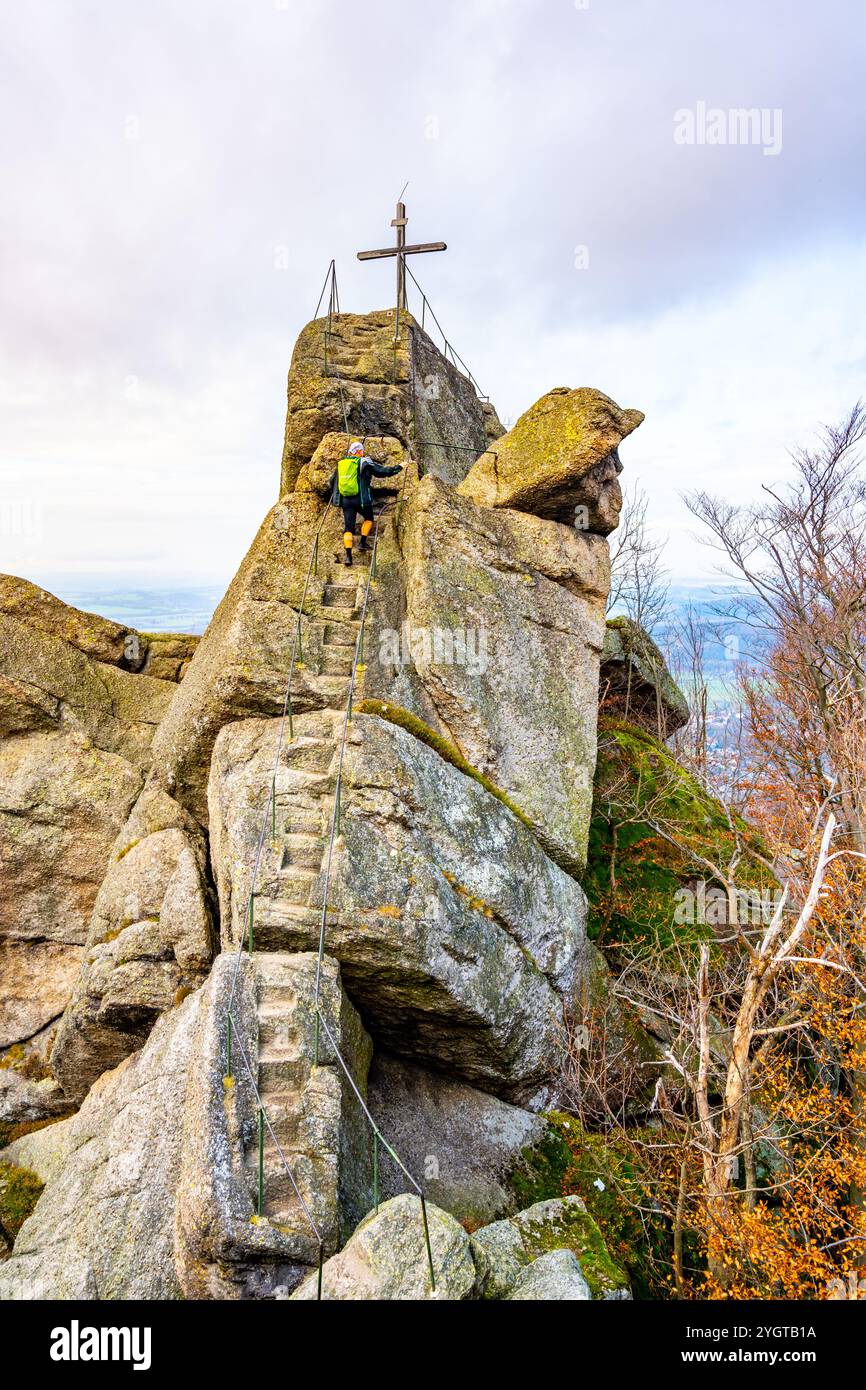 Adventurers navigate the stone steps of the Oresnik granite formation ...
