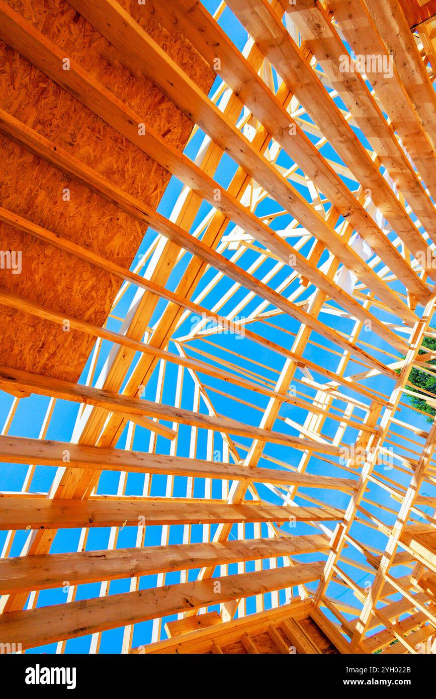 Wooden beams are arranged in triangular rectangular patterns ...