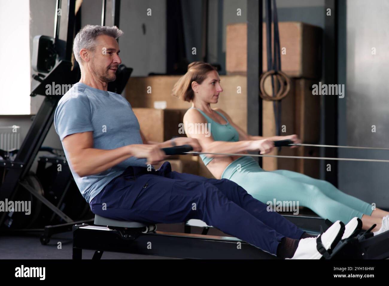 Strong woman using resistance hi-res stock photography and images - Alamy