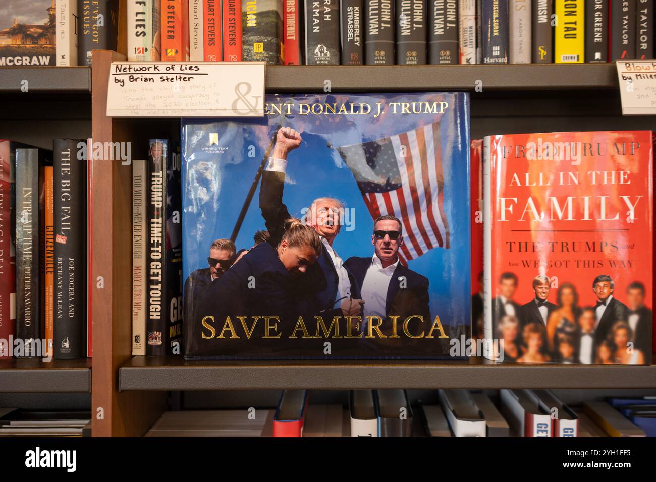 Books written by the Trumps, including 'Save America' by Donald J. Trump, on display at a bookstore in Tigard, Oregon, on Friday, November 8, 2024. Stock Photo