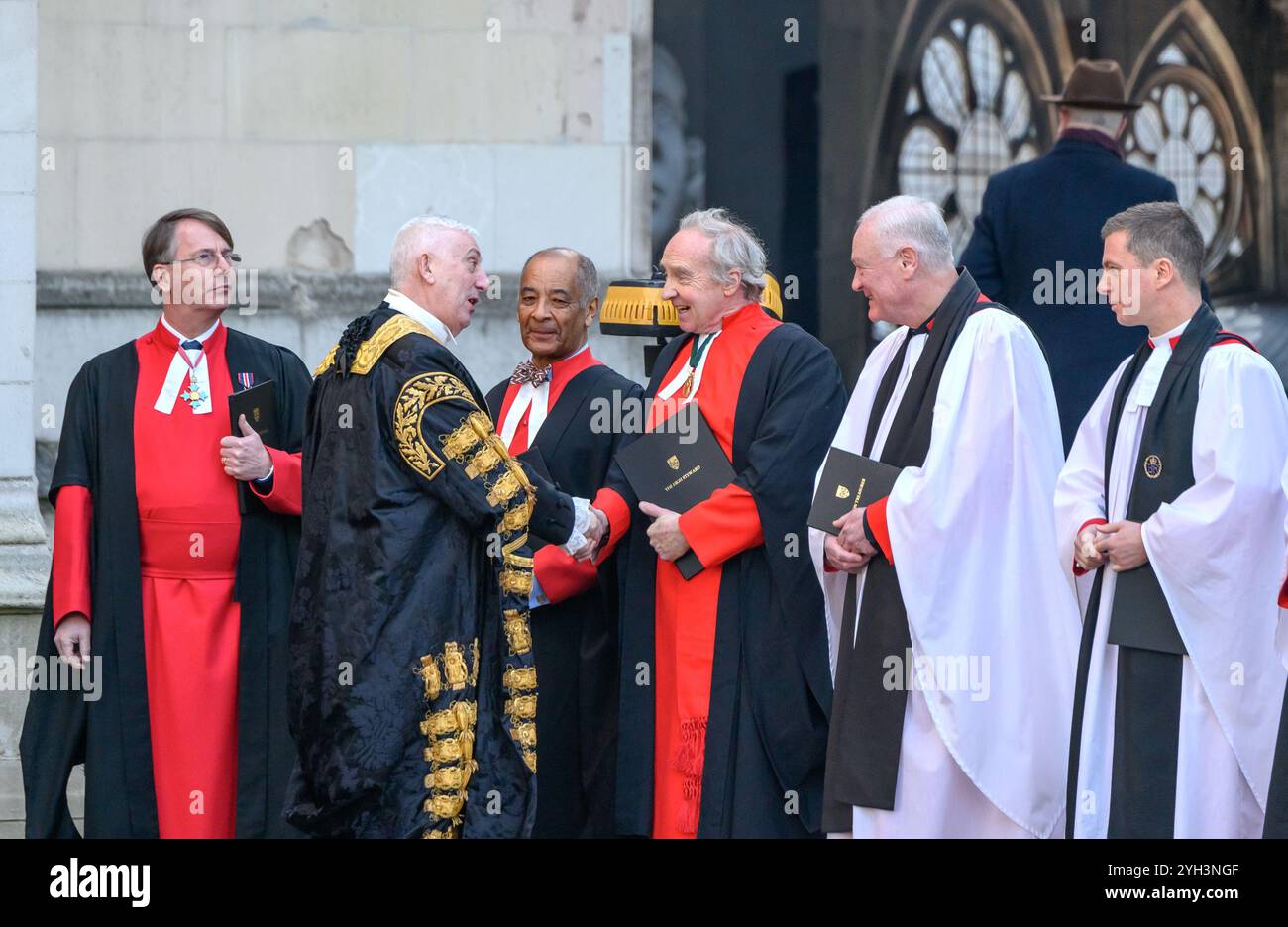 Sir Lindsay Hoyle MP (Speaker of the House of Commons) shaking hands with the High Steward of Wesminster Abbey - Richard Scott, 10th Duke of Buccleuch Stock Photo