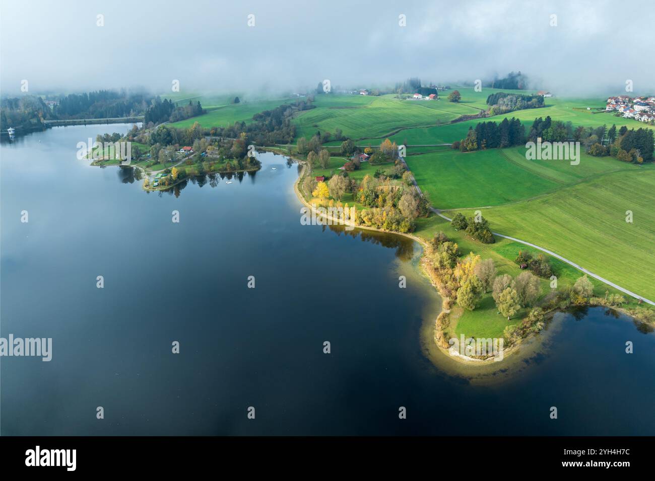 Sports facility and bathing area, lake Rottachsee, shore covered with fog,  autumn, aerial view, Allgaeu, Bavaria, Germany Stock Photo