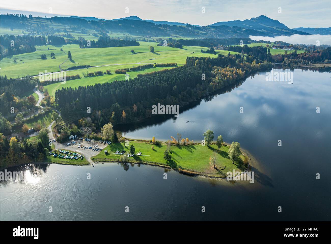 Sports facility and bathing area, lake Rottachsee, at village Petersthal,  mt. Gruenten in the back, autumn, aerial view, Allgaeu, Bavaria, Germany Stock Photo