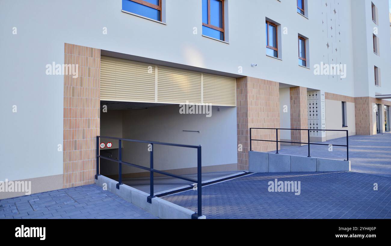 Condominium building garage parking entrance hi-res stock photography ...