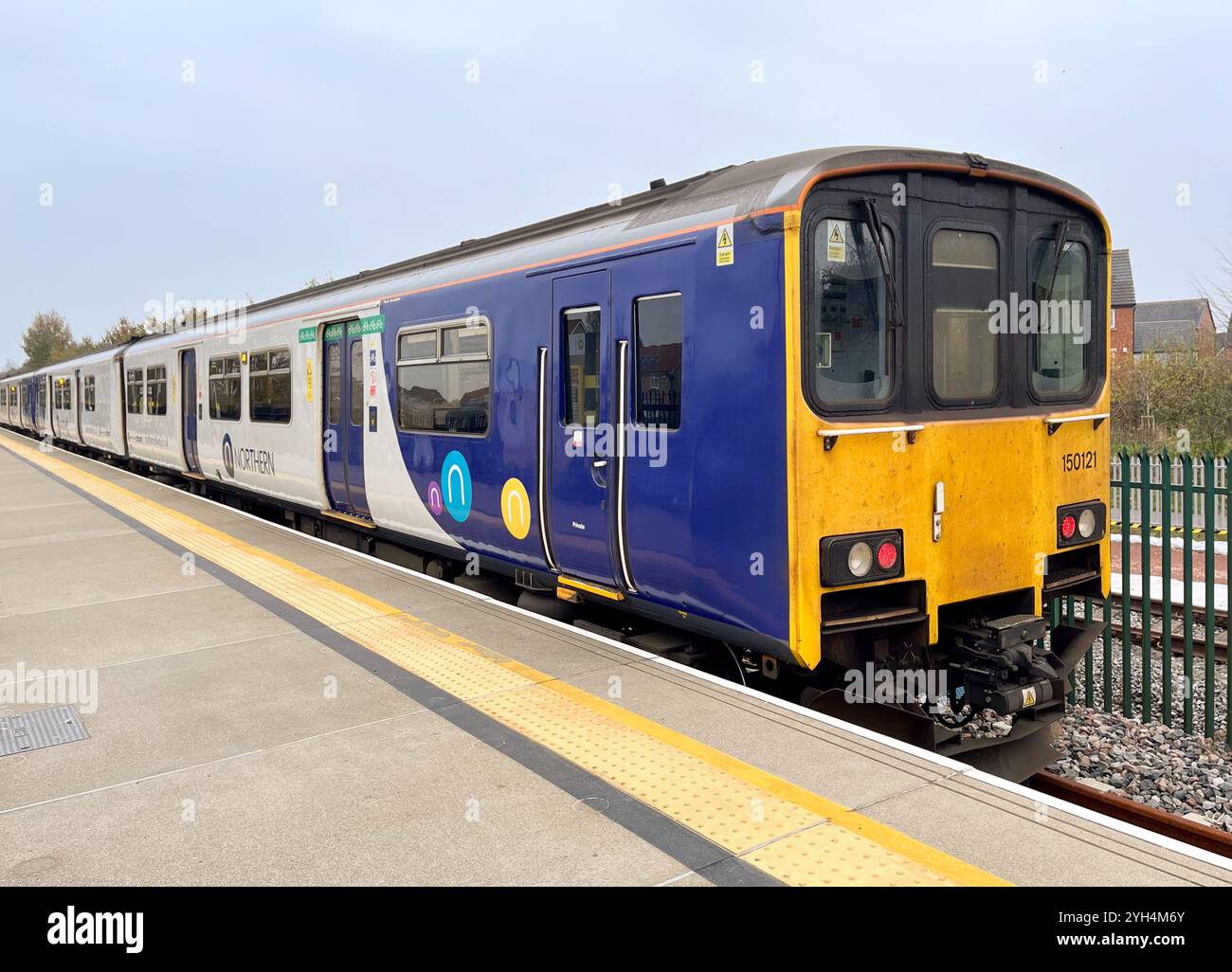 A Northern train at Headbolt Lane Station in Kirkby UK - Smartphone Captured Stock Image
