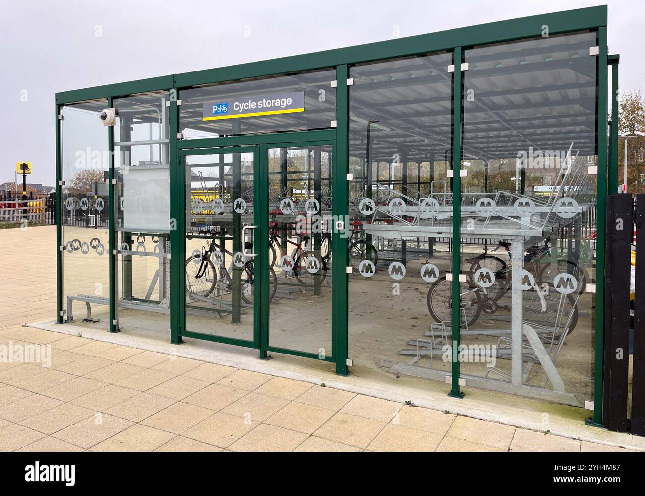 Secure bike storage at Headbolt Lane Station in Kirkby,Merseyside UK - Smartphone Captured Stock Image