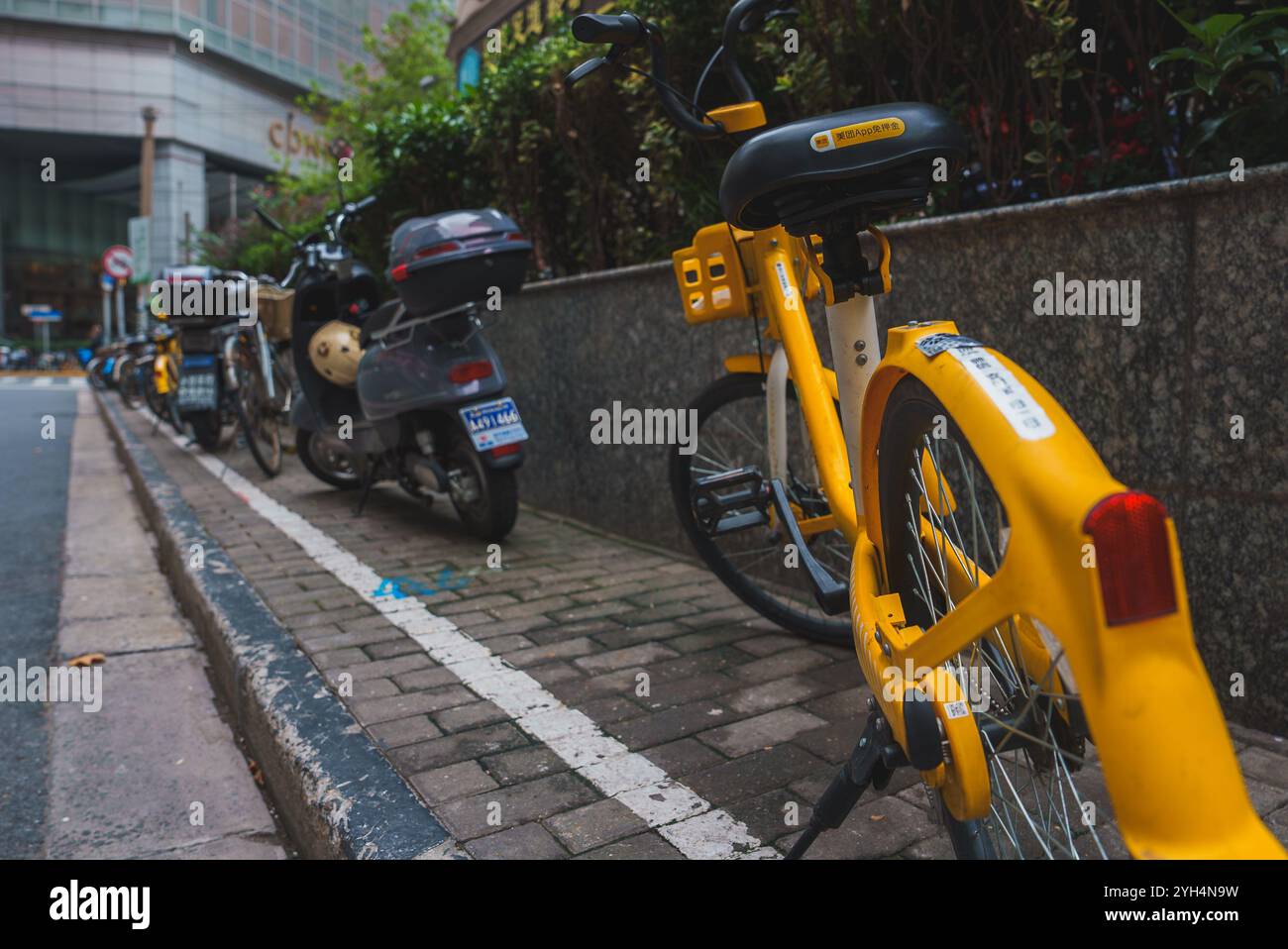 Scooters at bike rack hi-res stock photography and images - Alamy