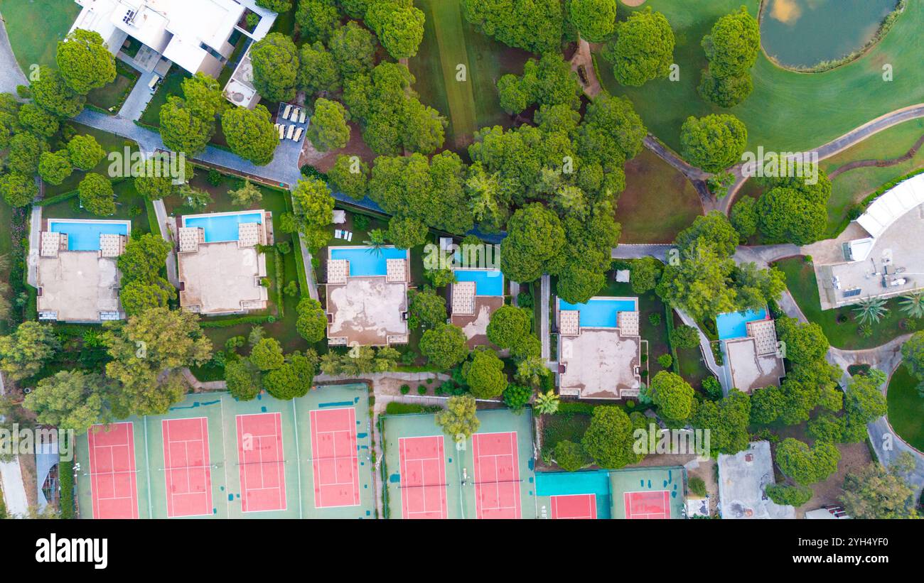 Curated visual reference: Gallery Detail: Aerial View Of Luxury Villas With Private Pools And Tennis