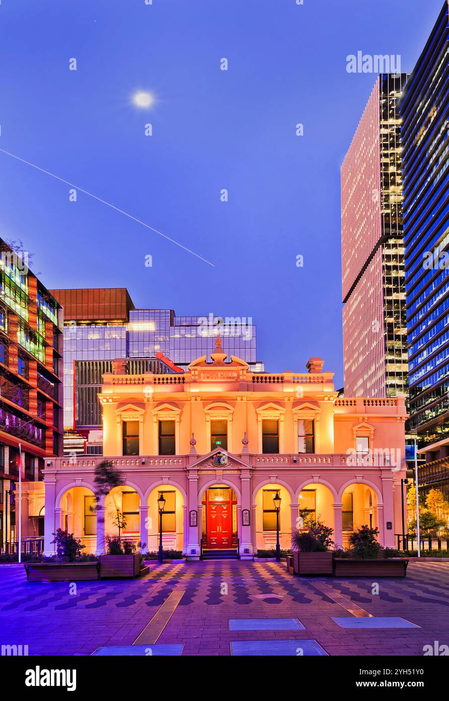 Vertical panorama of Parramatta Western Sydney city CBD local government public building of the town hall at sunset. Stock Photo