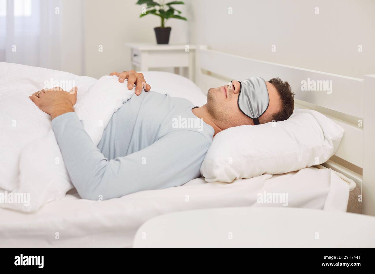Man sleeping mask on eyes hi-res stock photography and images - Alamy
