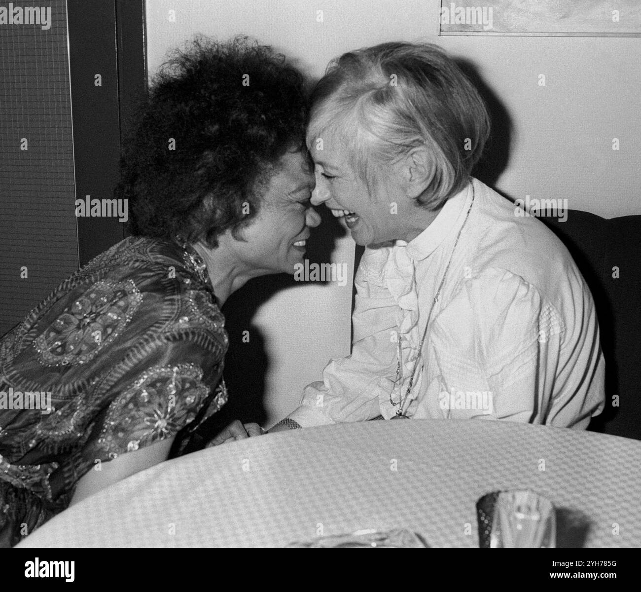 KARIN FALCK Producer Sweden´s television in a confidential conversation with American singer Eartha Kitt during a recording break Stock Photo