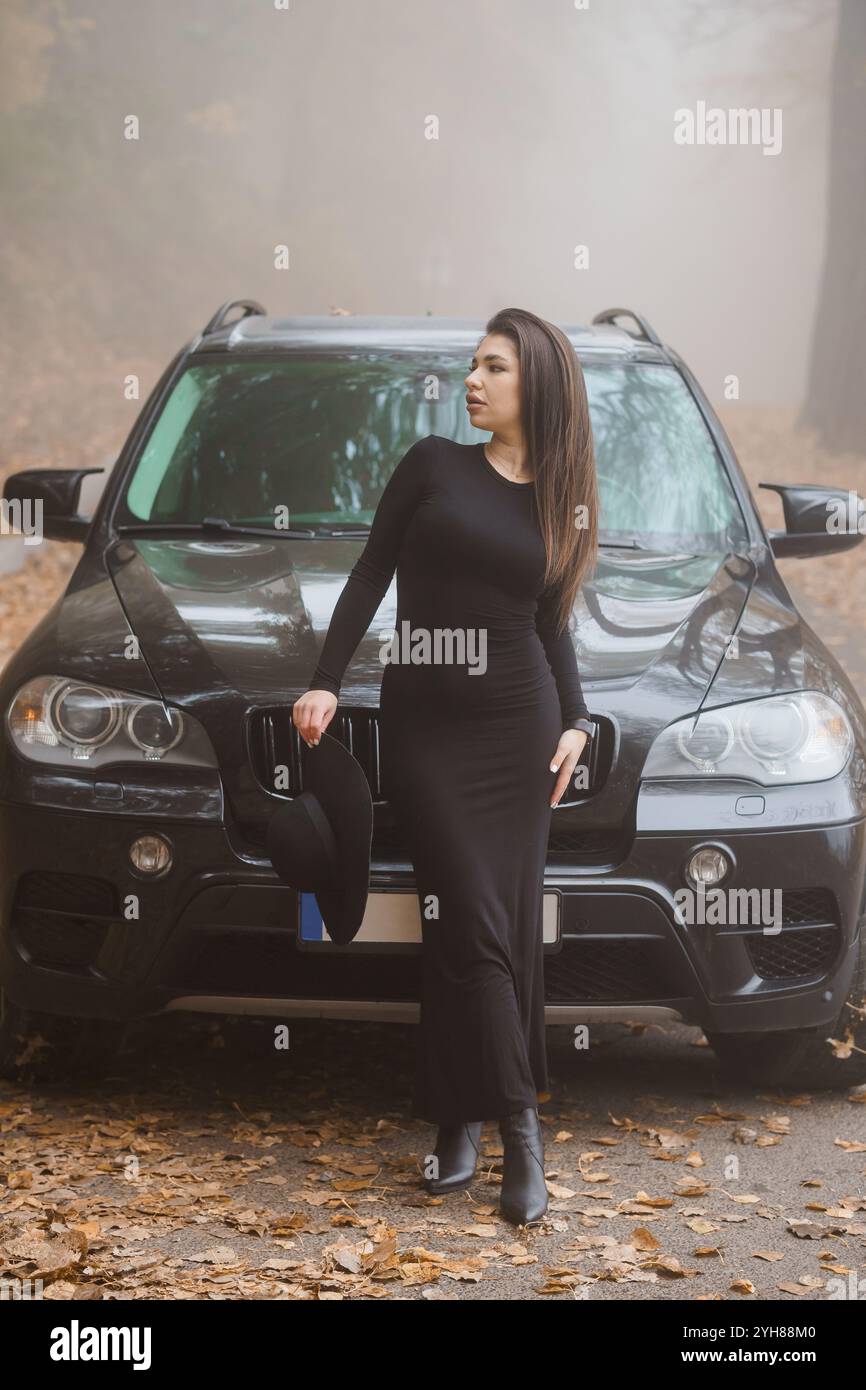 A woman with black dress in the woods hi-res stock photography and images -  Alamy
