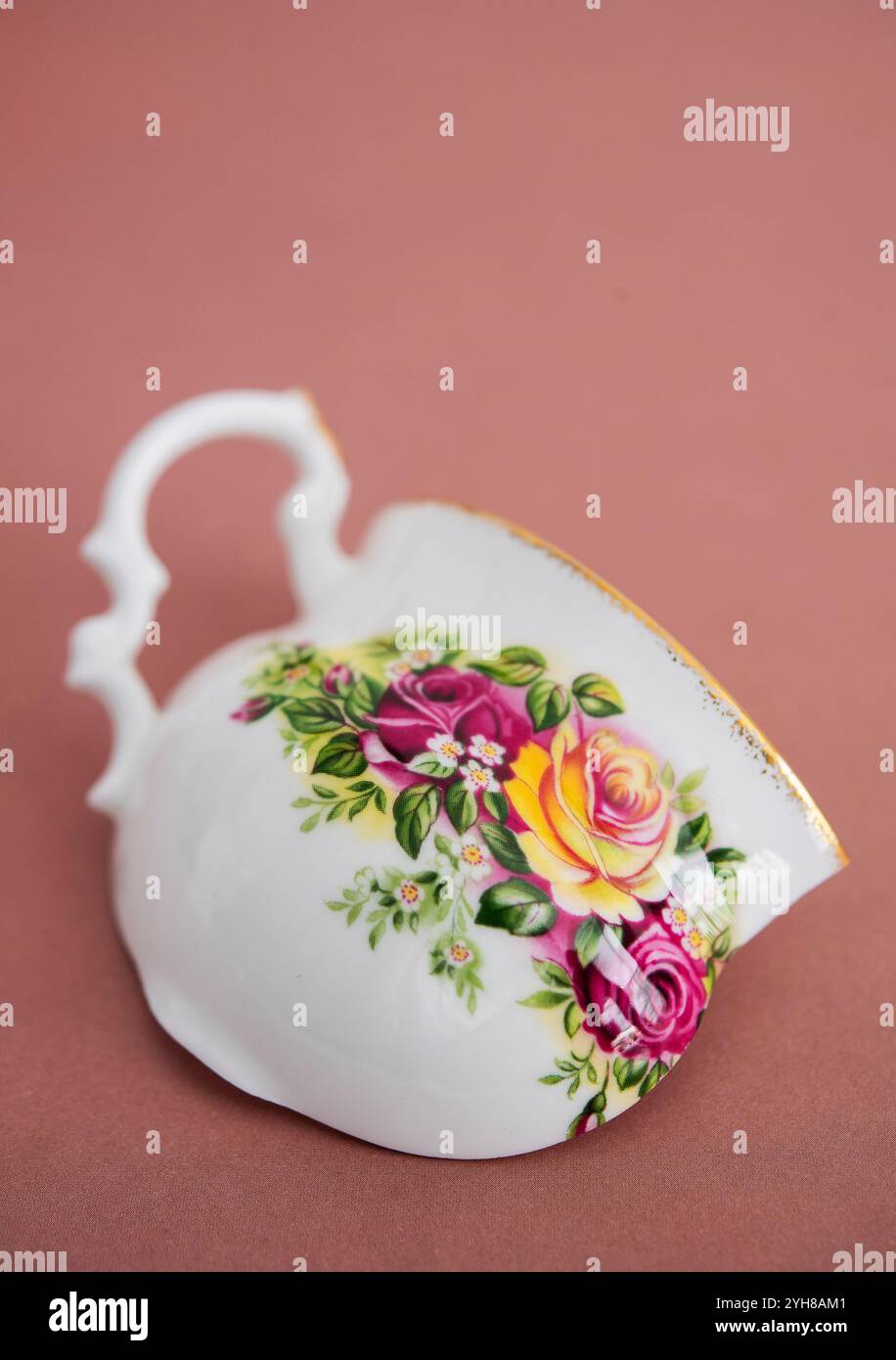 Still life of a broken teacup Stock Photo