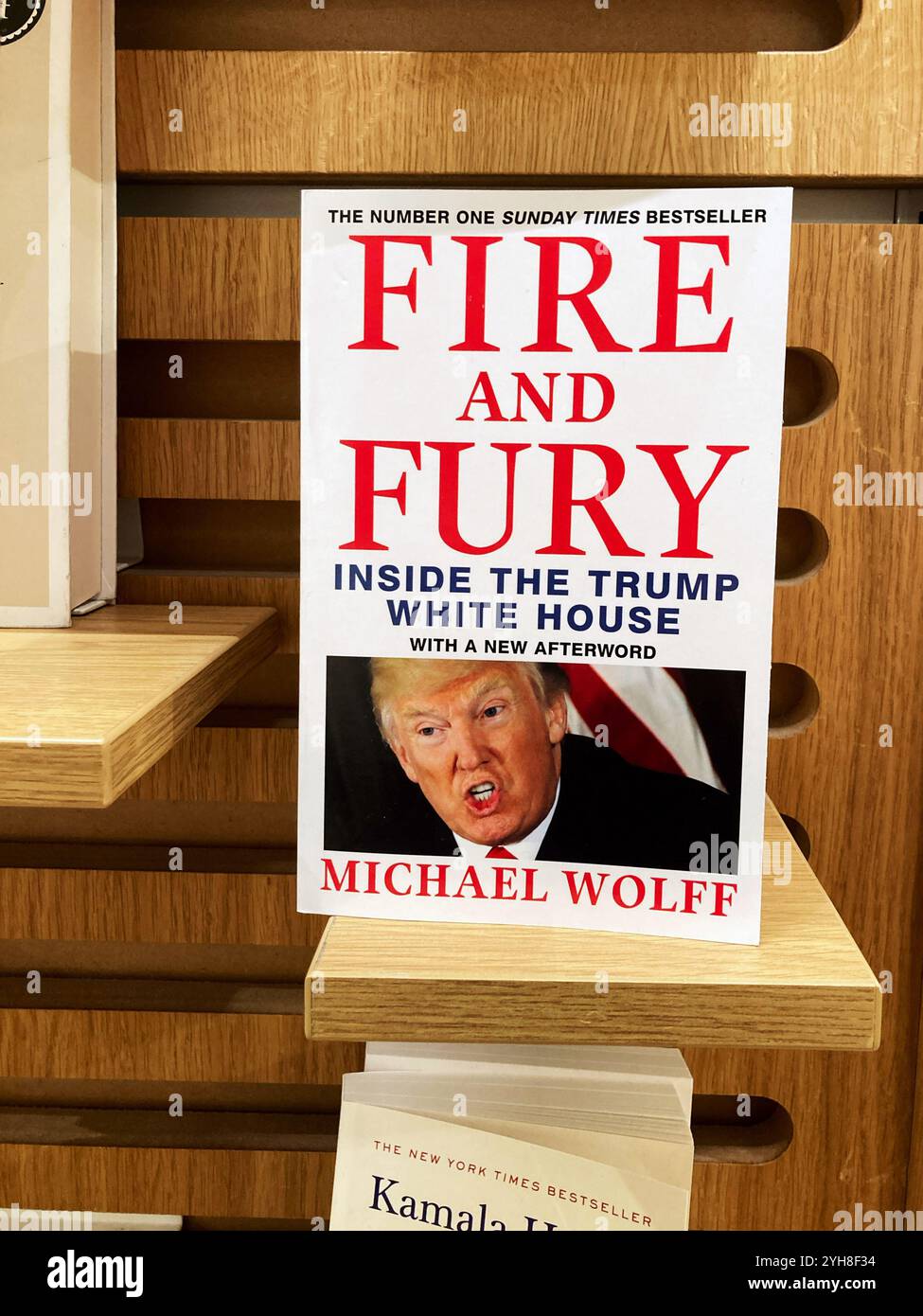 Fire and Fury: Inside the Trump White House is a book by journalist Michael Wolff, for sale at the local book store - Smartphone Captured Stock Image