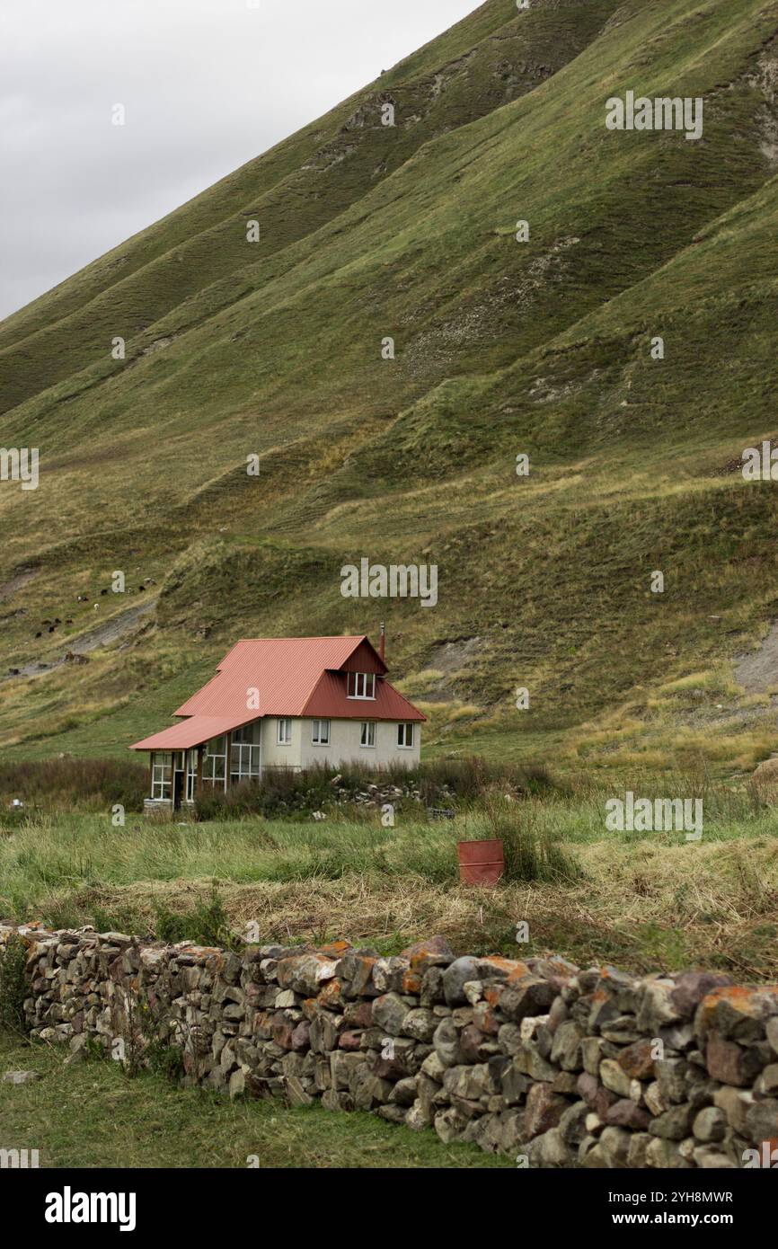 George Rurual Scene This vertically-oriented photograph depicts a charming rural scene in ...