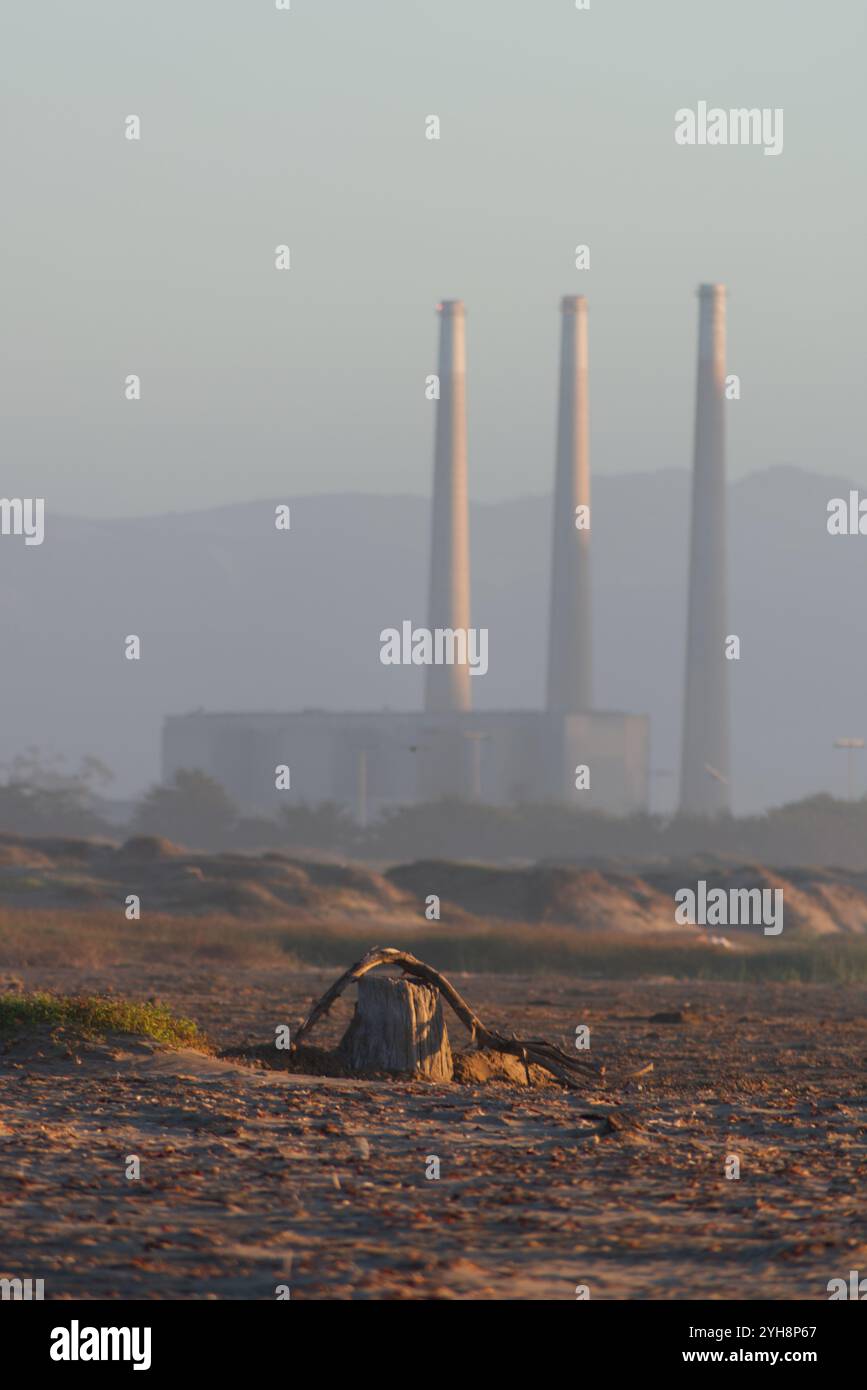 Morro Bay smoke stacks viewed from MOrro Strand State Beach. Stock Photo