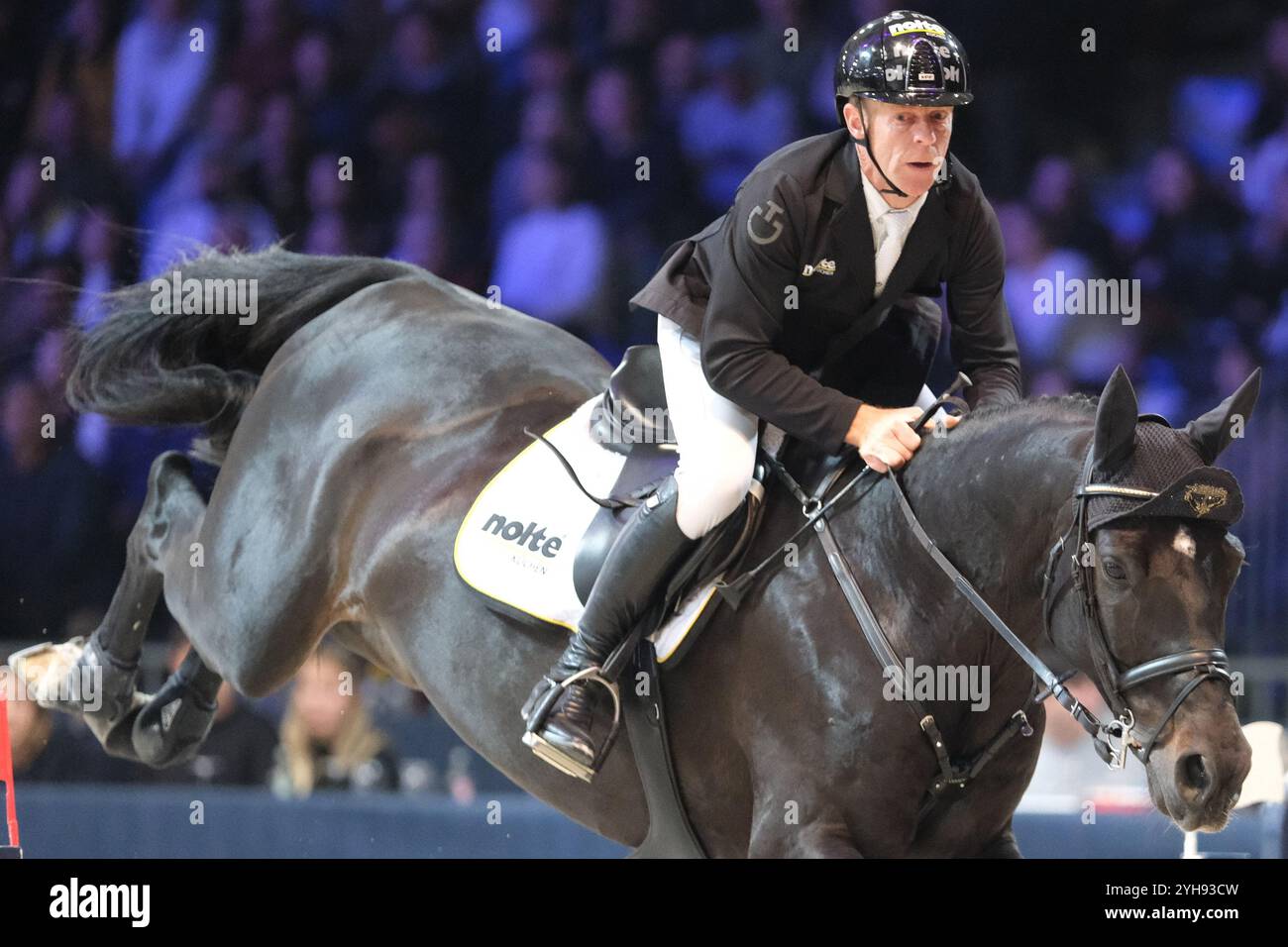 Verona, Italy. 10th Nov, 2024. Marcus Ehning riding Coolio 42in action during CSI5*- W Longines FEI Jumping World Cup 2024 Gran Prix presented by KASK, at Pala Fimauto on November 10, 2024, Verona, Italy. Credit: Roberto Tommasini/Alamy Live News Stock Photo