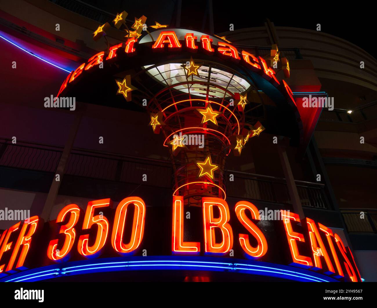 LAS VEGAS, NEVADA, USA - JUNE 02, 2013:  Neon signs for Heart Attack Restaurant in Downtown Las Vegas at night Stock Photo
