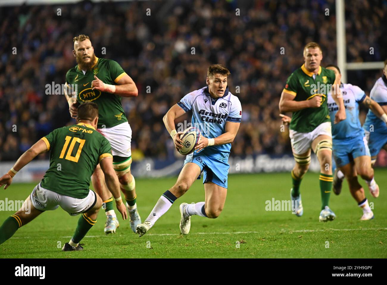 Scottish Gas Murrayfield .Edinburgh Scotland UK 10th November 24 AUTUMN TESTS 2024/25 Scotland v South Africa Tom Jordan of Scotland evades S. Africa Handre Pollard Credit: eric mccowat/Alamy Live News Stock Photo