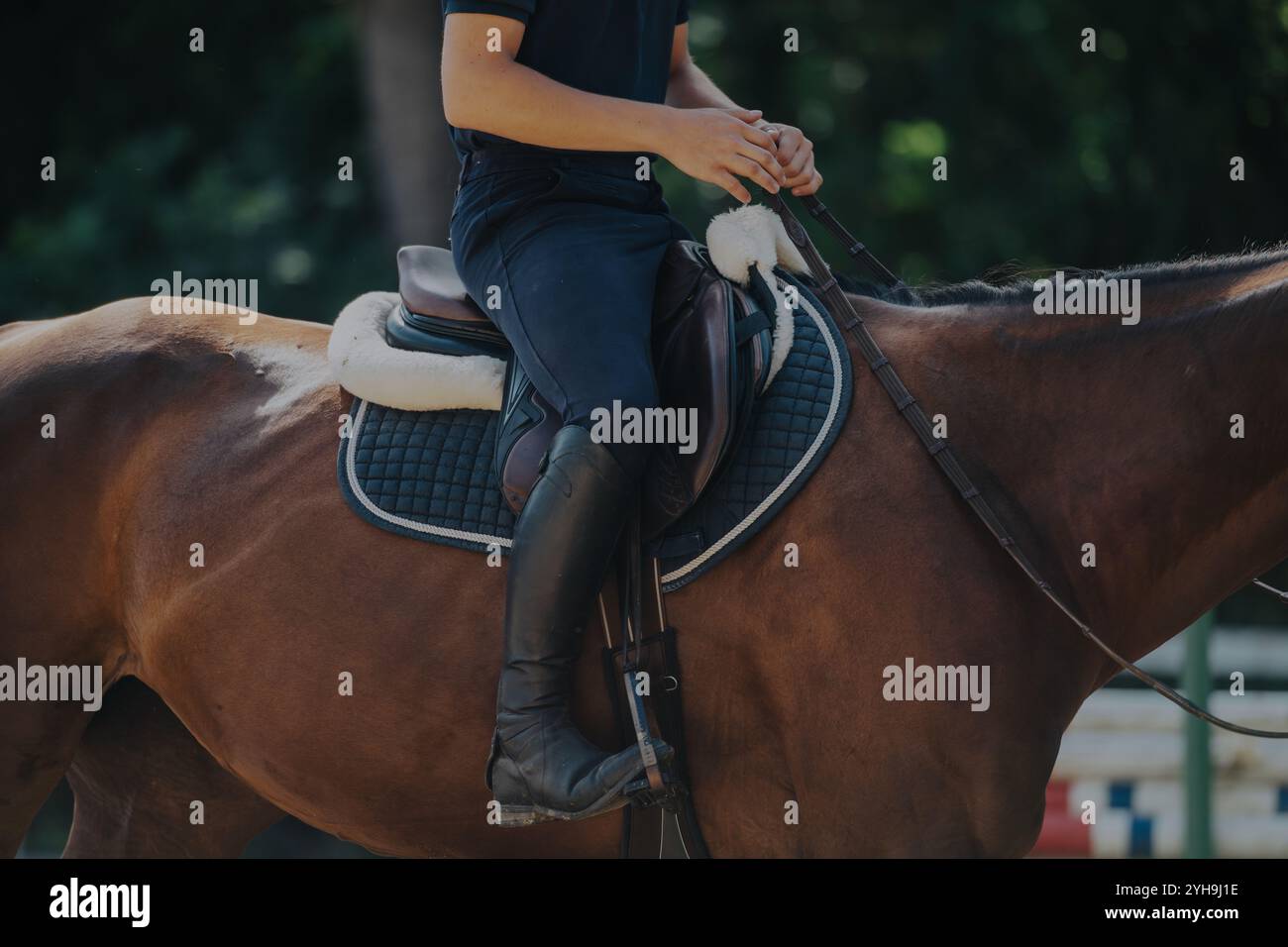 Rider in black attire hi-res stock photography and images - Alamy