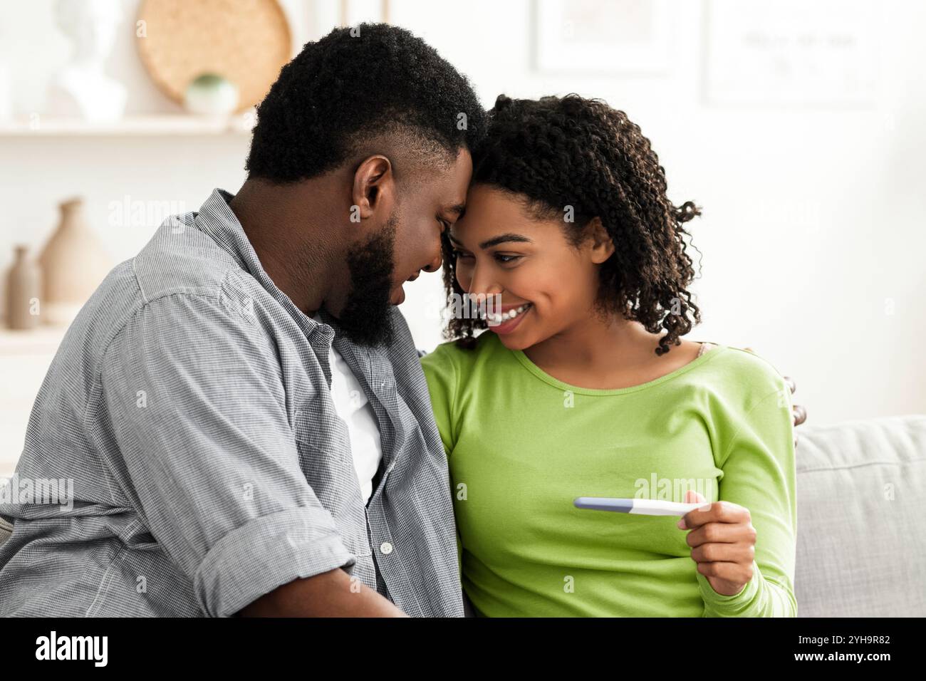 Future Parents. Portrait of happy black couple with positive pregnancy ...