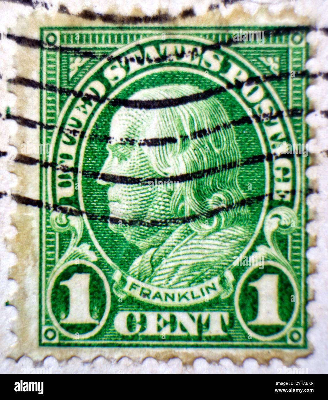 One cent Ben Franklin green US Postage stamp from the early 20th