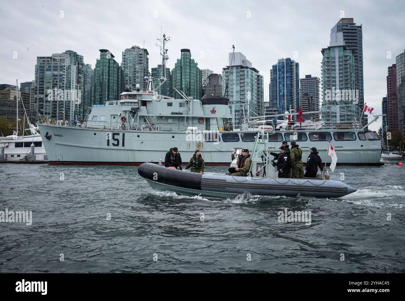 Canadian Army Master Warrant Officer Devon Hatcher, third from left ...