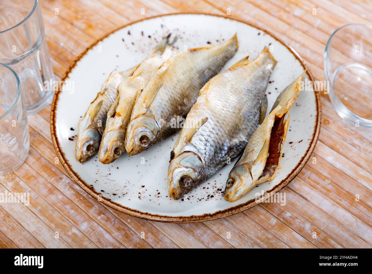 Dried roaches served on wooden table Stock Photo