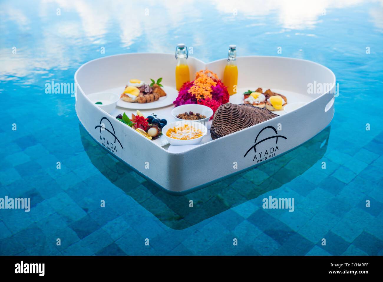 Floating breakfast in a heart shape in the pool in Maldives Stock Photo ...