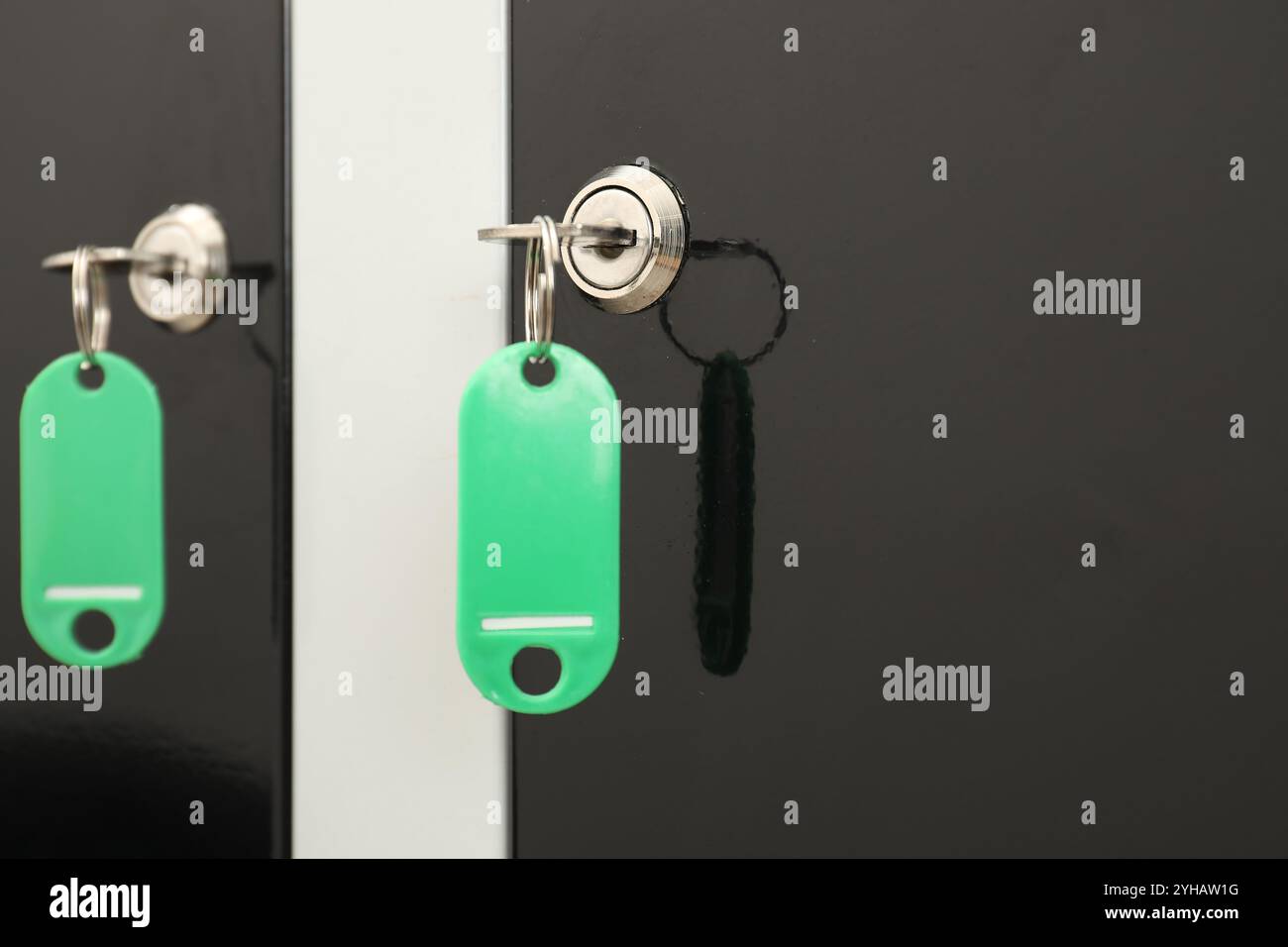 Modern lockers with bright keys, closeup view Stock Photo