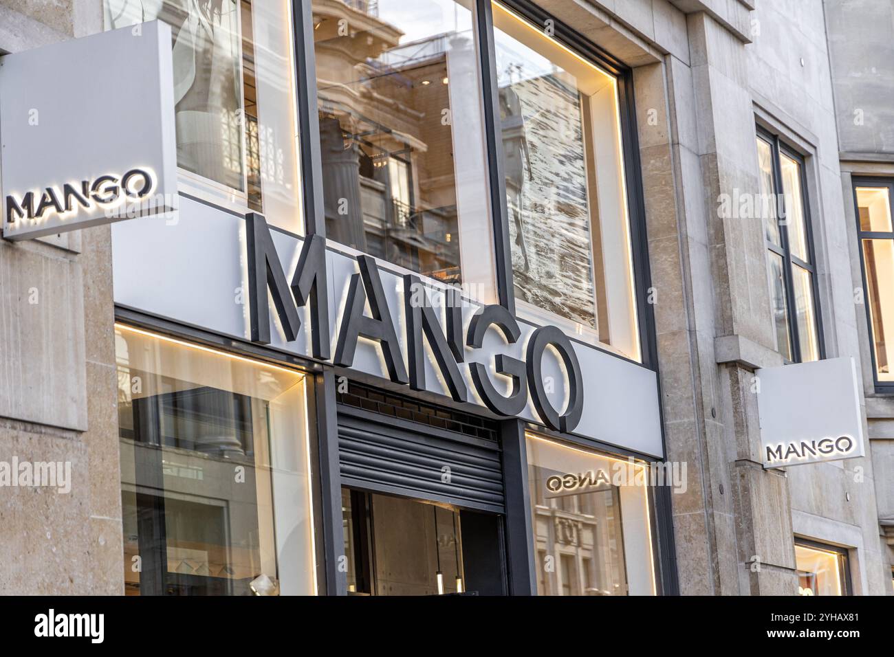 London, UK- September 19, 2024: MANGO brand logo and Fashion Storefront ...