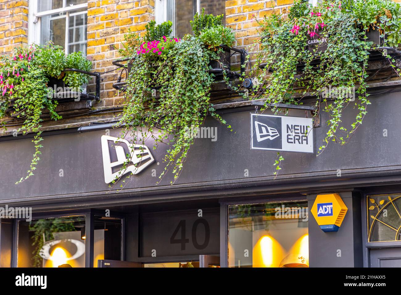 London, UK- September 19, 2024: New Era Store Front with Iconic Logo in ...