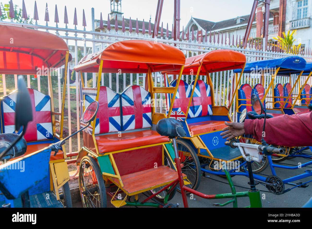Antsirabe, Madagascar - August 30, 2024: Colorful traditional rickshaws ...