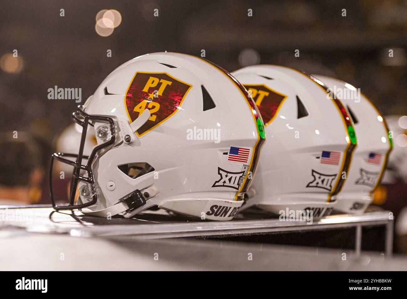 Arizona State Sun Devils helmets rest on the sideline in the fourth quarter of an NCAA football game against the Central Florida Knights in Tempe, Ari Stock Photo