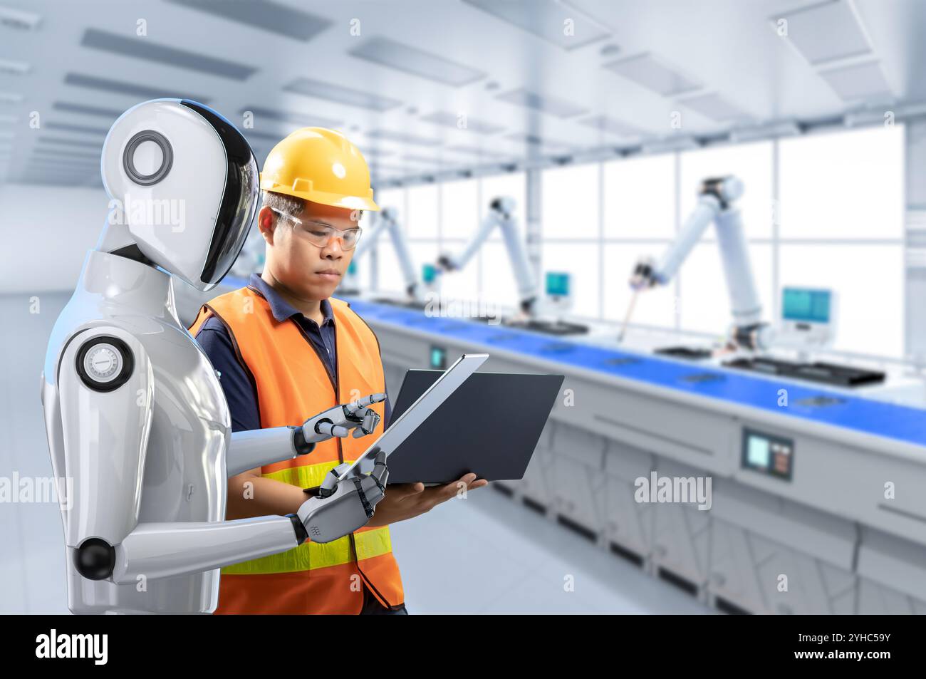 Automation industry concept with engineer control robot assembly line in factory Stock Photo